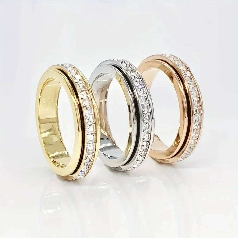 Elegant band ring made of stainless steel, set with shiny zircon, rotatable design, pressure relief H260312