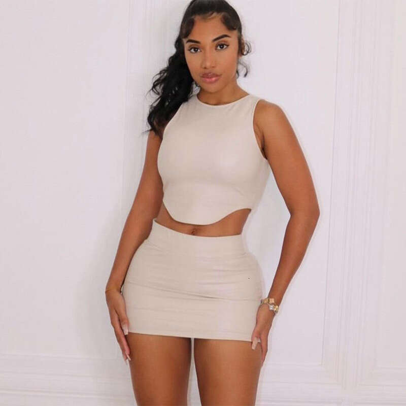 New European American Style Amazon Autumn Women's Fashion Set: PU Sleeveless Vest and Bodycon Short Skirt Set for Women