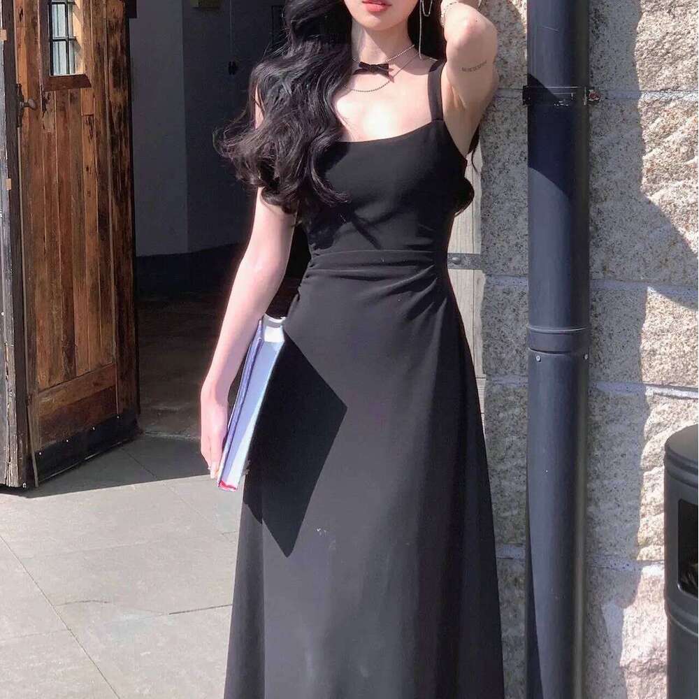 2025White lining women's summer new dress, waist-cinching slimming design sense of minority French strap dress. C260312