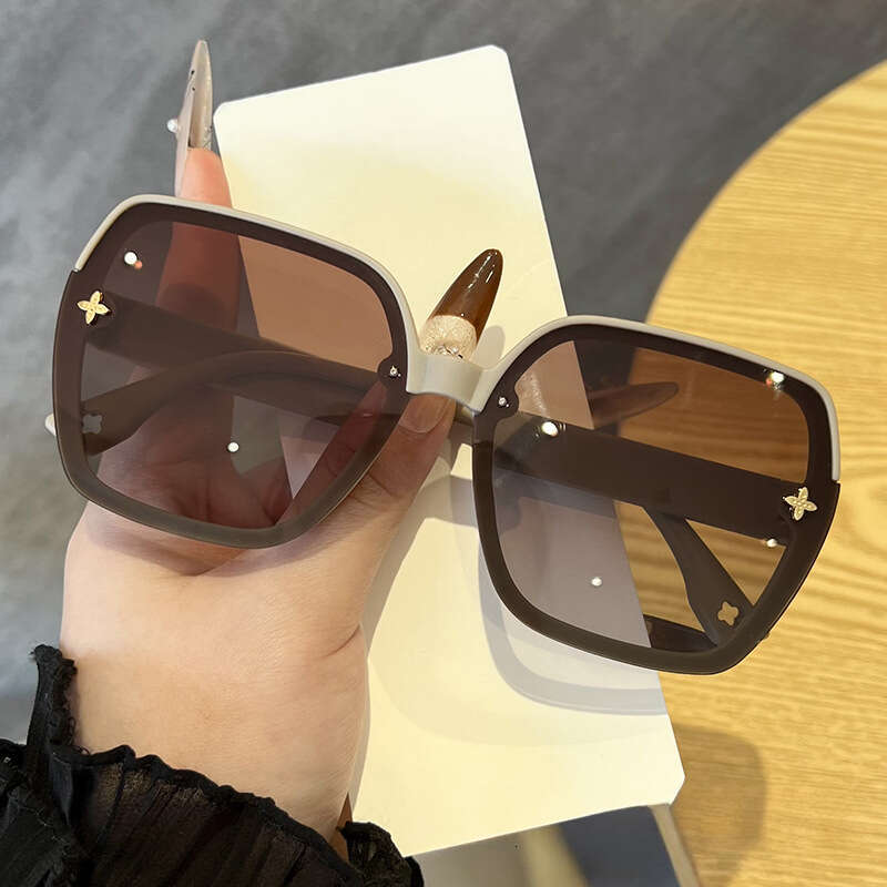 Luxury Sunglasses for Women Classic Trendy Popular Polygonal frame Tinted purple lenses Beach Vacation Sun Glasses Face Slimming Effect