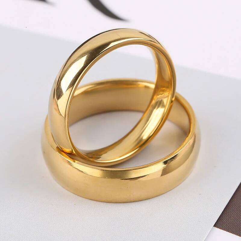 2023 New Fashion Simple Smooth Stainless Steel Ring for Women and Men Classic Gold Color Couple Rings Wedding Engagement Jewelry H260312