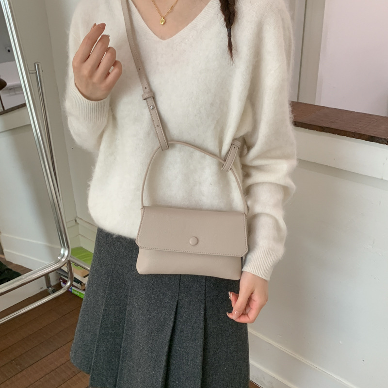 Spring luxury handbag, high-end minimalist design, mobile phone bag, fashionable button envelope, crossbody bag, shoulder bag, crossbody bag