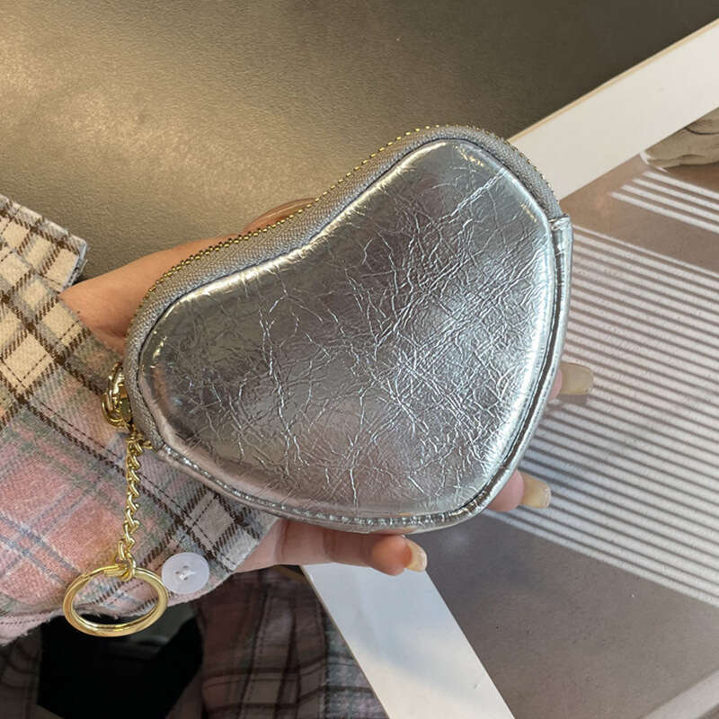 Luxury fashion wallet Korean Niche Heart Shaped Pendant Purse For Women New High End Cowhide Coin Card Holder Earphone Bag Zipper Keychain