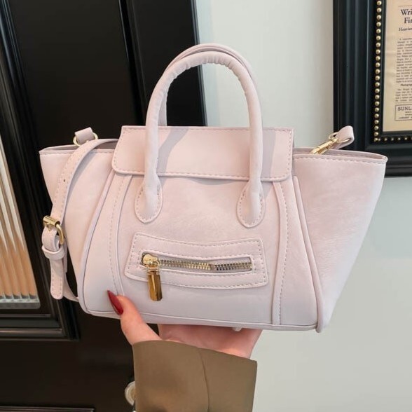 Unique smiley face bag spring new multifunctional high-end shoulder bag wing bag large capacity commuting handbag designer bag