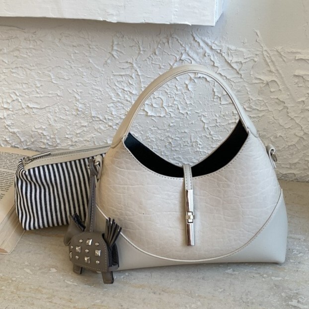 New high-end niche design cowhide dumpling bag multifunctional elegant handbag shoulder bag women's crossbody bag designer bag