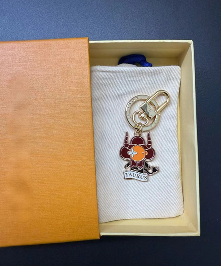 12 ecliptical constellations Diamonds Colored Gemstones chain Designer Keychain Bag Charm Meatl Painted sunflower Creative Bag Pendant Fashion Creative 678