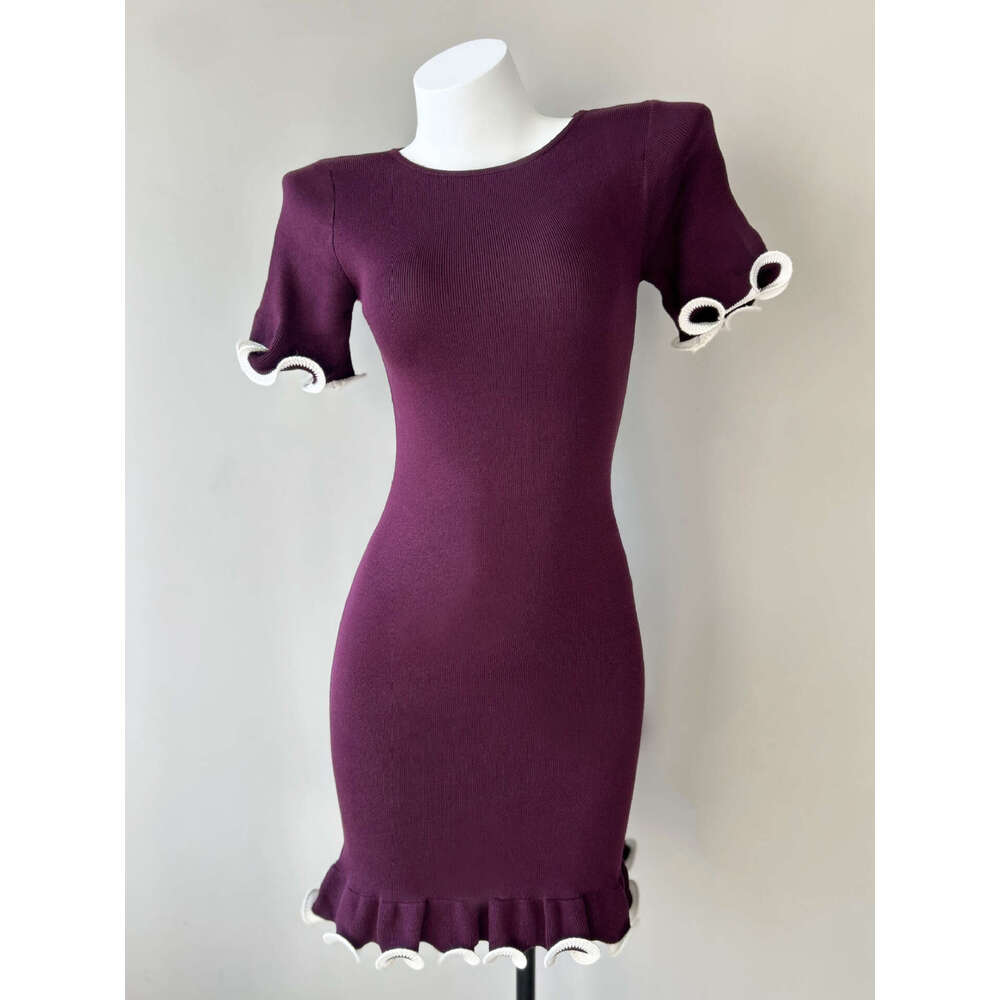 Sexy tight pleated short skirt with curled edges, slim knit dress with long sleeves, solid color, European and A15 American women's summer wear