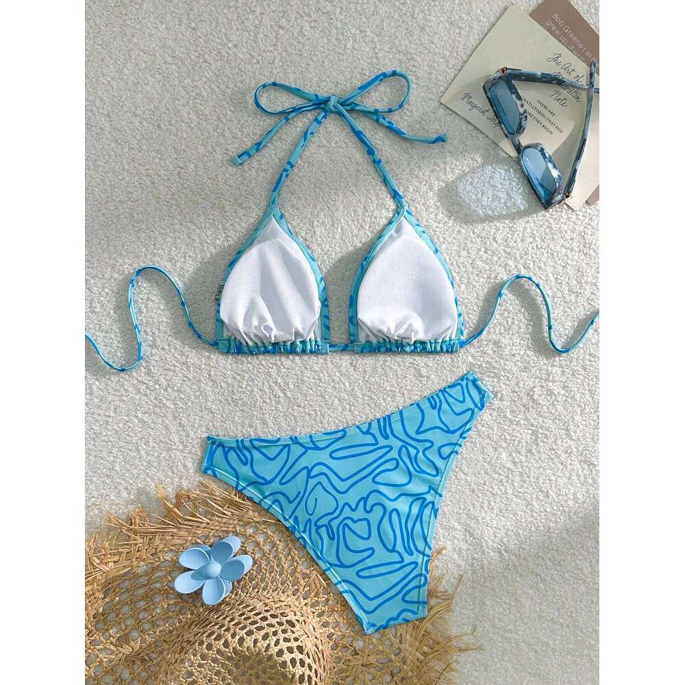 The blue striped bikini design fashionable individual the halterneck tie can be adjusted freely and it is a must-ha 26H0313