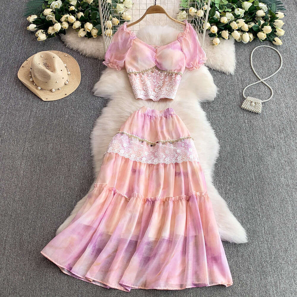 2026 French elegant fairy like women's lace patchwork short shirt slim fit design paired with tassel cake skirt