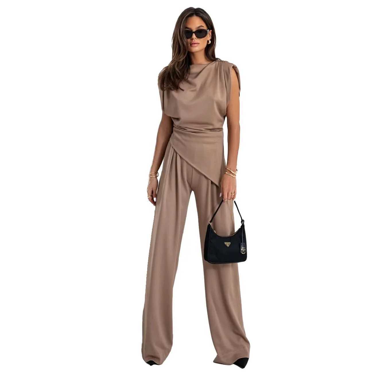 womens clothing set in Europe and America featuring solid colors irregular short-sleeved shirts and loose trousers M260313