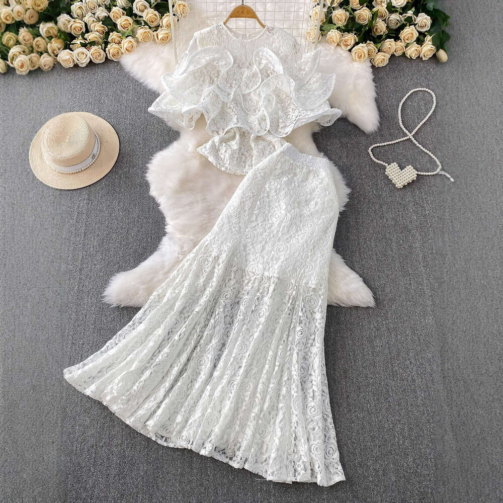 Designer style elegant lace top with three-dimensional pleated edges, two-piece set with high waist and slim fit fishtail skirt