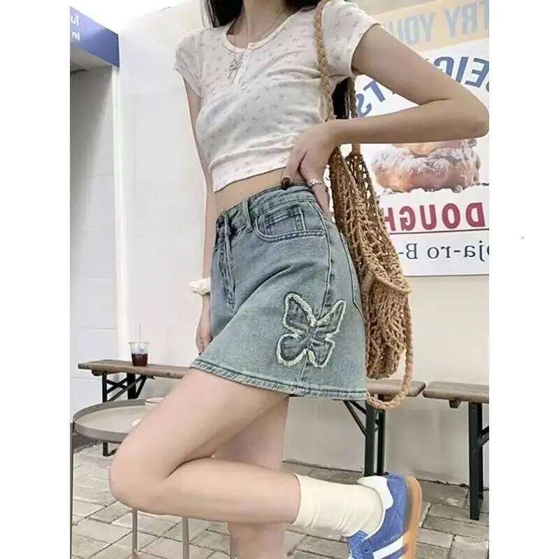 Women's personalized denim small internet celebrity fashion 2025 summer new heavy industry Korean style work skirt Z260314