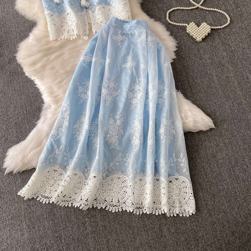 2026 designer French high-end blue lace up hollow sleeveless vest high waist slim fit skirt set