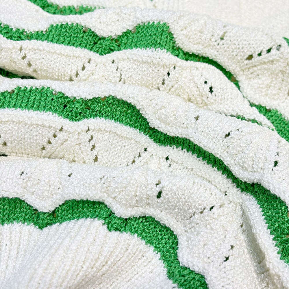 2026 French women's spring new style fresh and elegant lapel hollow striped short sleeved knitted pullover
