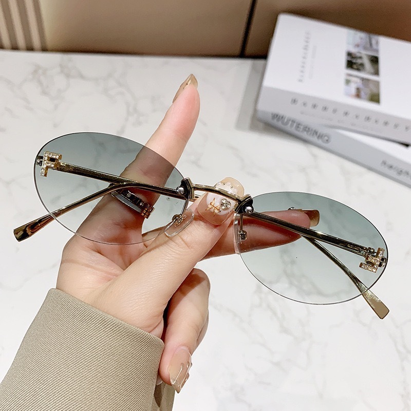 Frameless Designer Sunglasses with Diamond-Encrusted Oval Frames Fashion Sunglasses