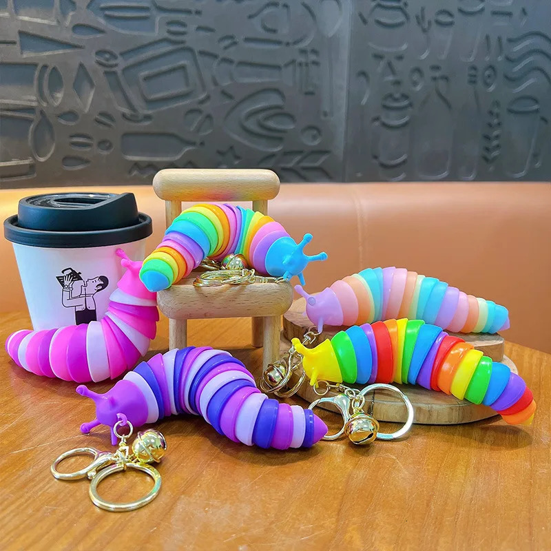 Cute Fidget Slug Keychain Toys 3D Articulated Stretch Sensory Stress Relief Flexible Keyring Bag Phone Pendent Charm 260311