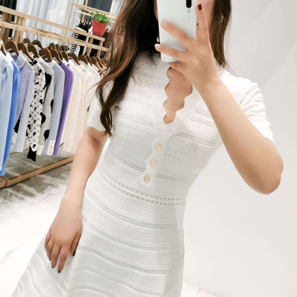 French wave edge V-neck high waisted hollow knit slim fit 2026 spring and summer olive green short sleeved A-line dress