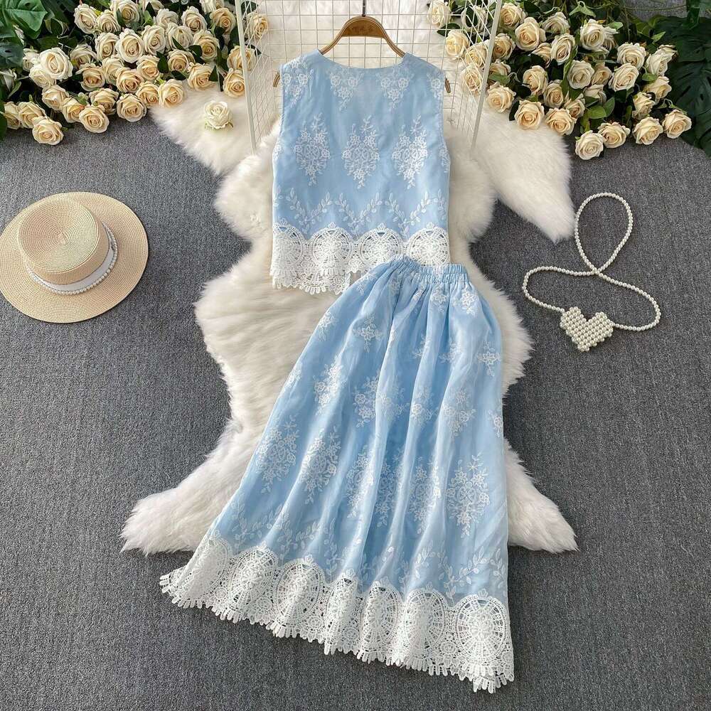 2026 designer French high-end blue lace up hollow sleeveless vest high waist slim fit skirt set