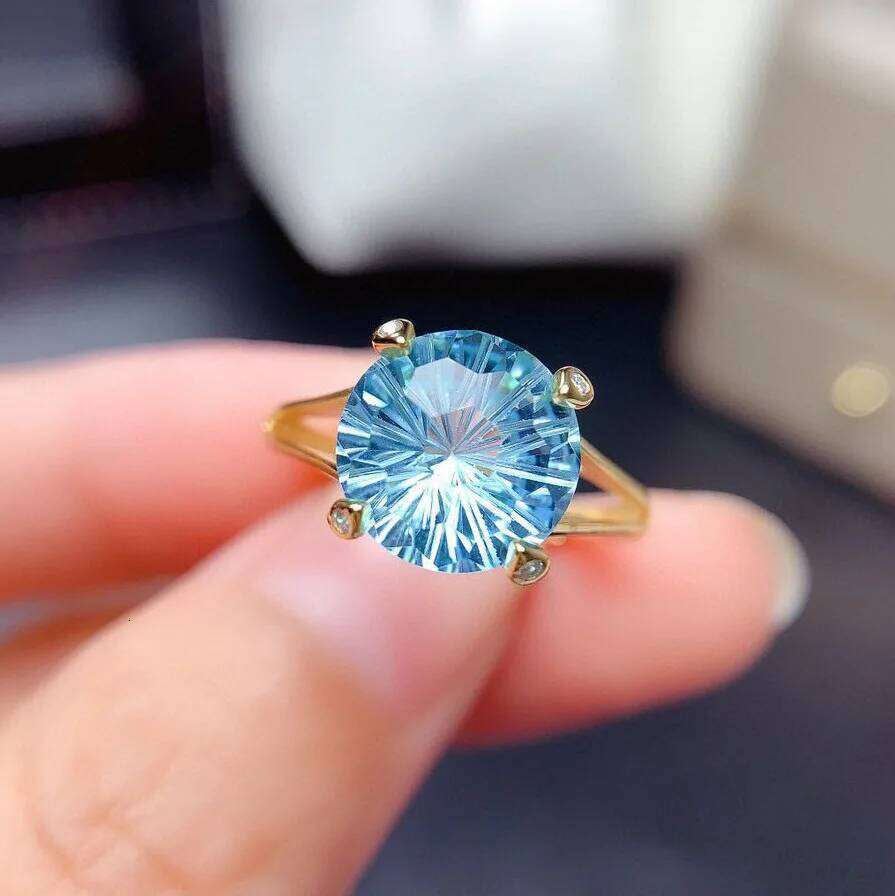 Single 14k gold laboratory aquamarine ring H260312