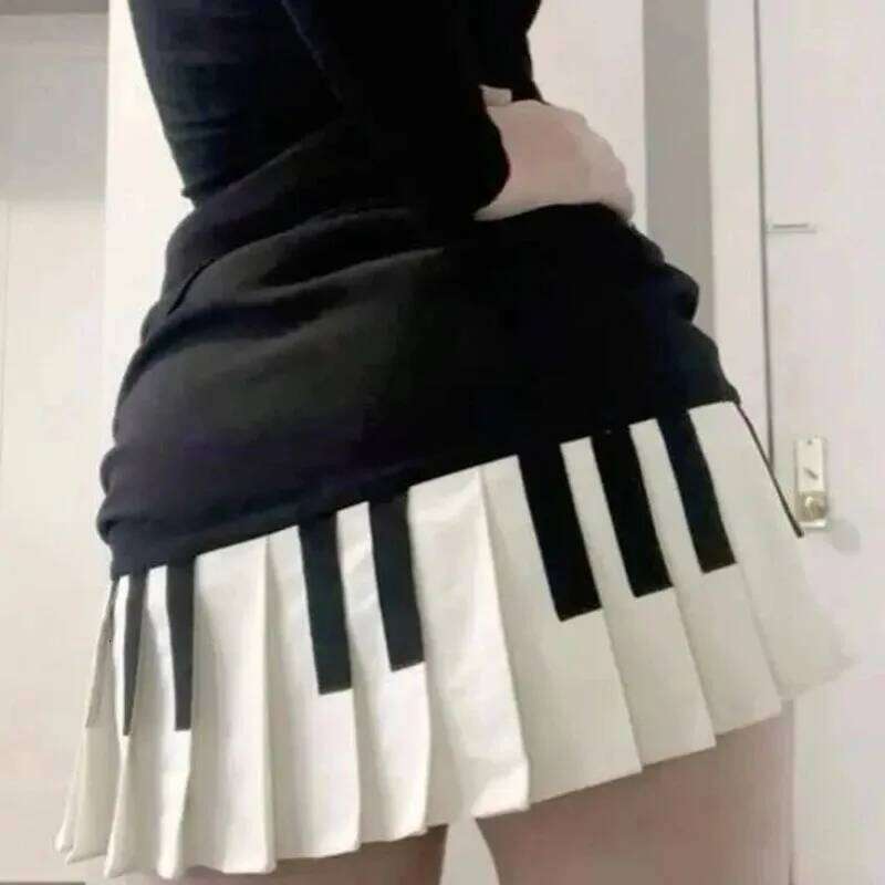 Sweet spicy style black white piano vintage pleated skirt for women's spring new design sense slimming and form-fitting Z260314