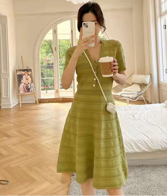 French wave edge V-neck high waisted hollow knit slim fit 2026 spring and summer olive green short sleeved A-line dress