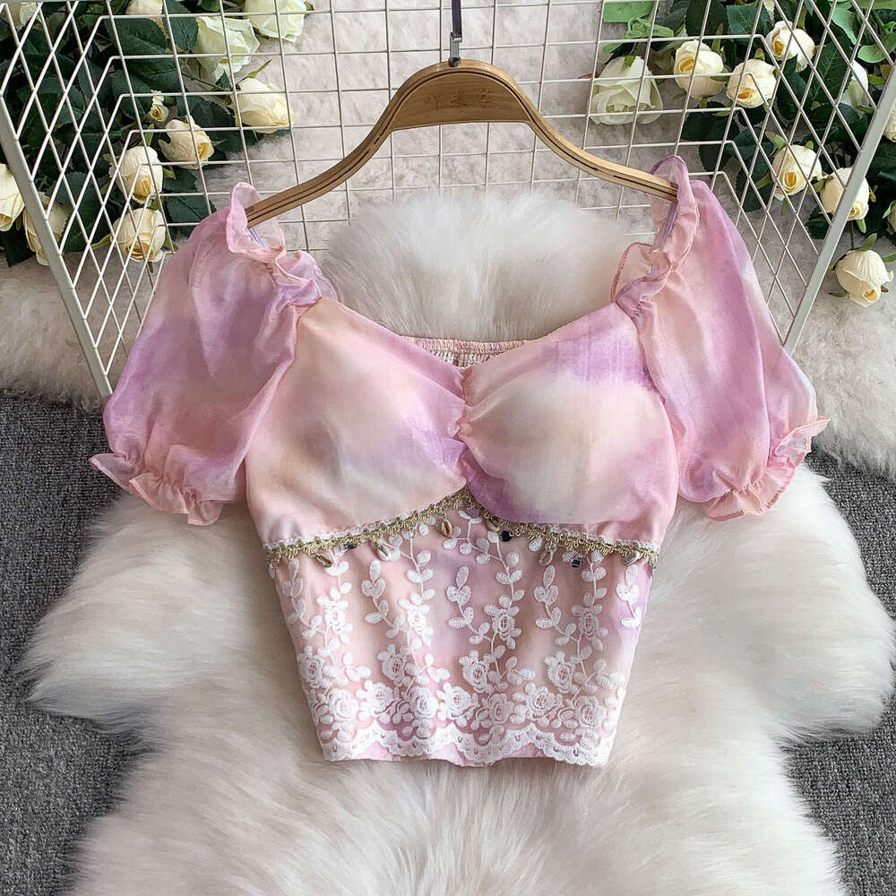 2026 French elegant fairy like women's lace patchwork short shirt slim fit design paired with tassel cake skirt