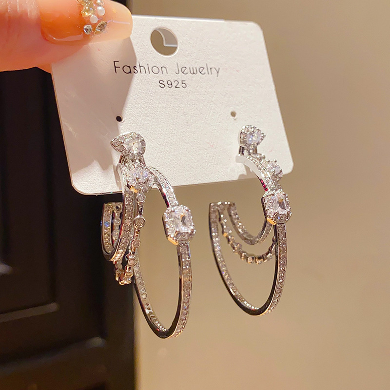 Silver needle metallic light-luxury diamond-embellished hollow geometric circular three-layer earrings with a niche high-end exquisite temperament