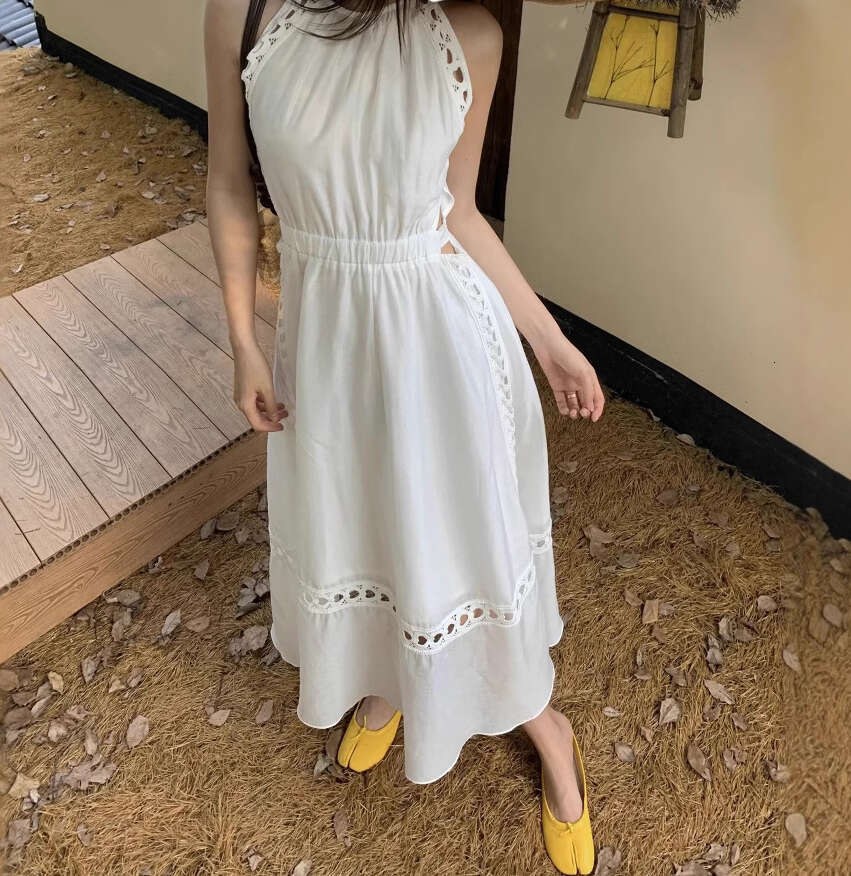 2026 Vacation French Elegant Hollow Heart White Lace Waist Sleeveless Backless Collar Casual Sweet Dress