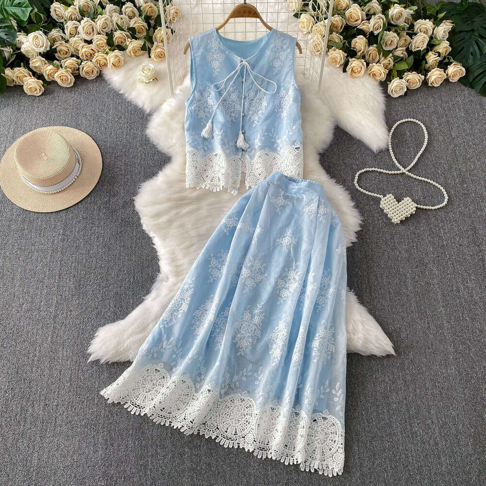 2026 designer French high-end blue lace up hollow sleeveless vest high waist slim fit skirt set