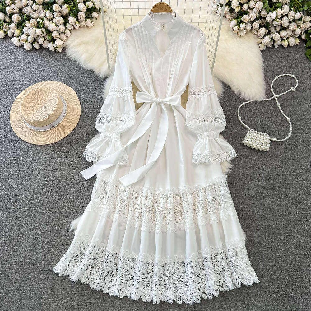 Designer fashion long sleeved V-neck pleated waist slim fit A-line hollow lace dress paired with elegant long skirt