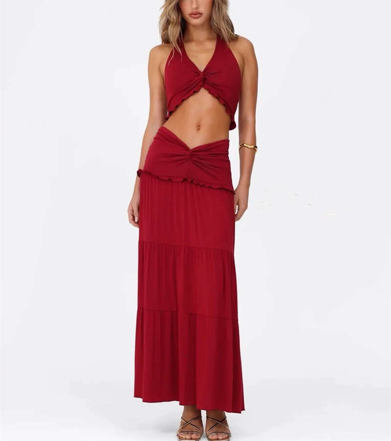 2026 spring and summer women's niche fashion sexy backless and navel exposed top low waist long skirt set