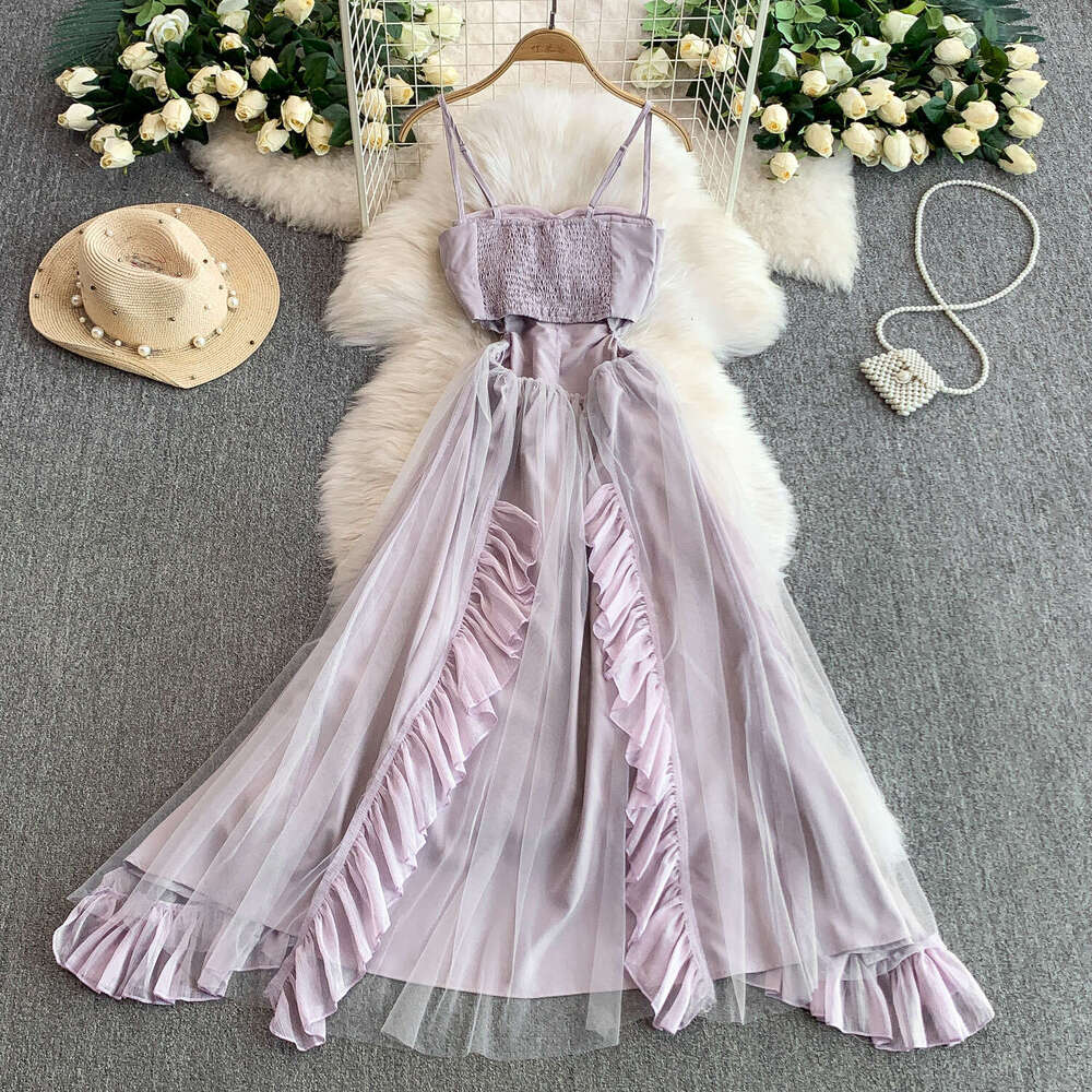 Designer seaside vacation style dress, chest cushion, shoulder strap, slim fit, elegant mesh splicing, sexy ruffles