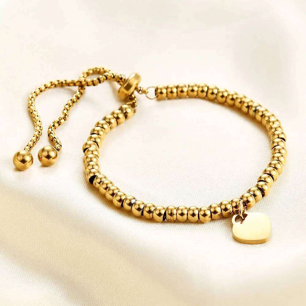 A 26-letter stainless steel simple and fashionable heart-shaped letter tag bead personalized bracelet Z260313