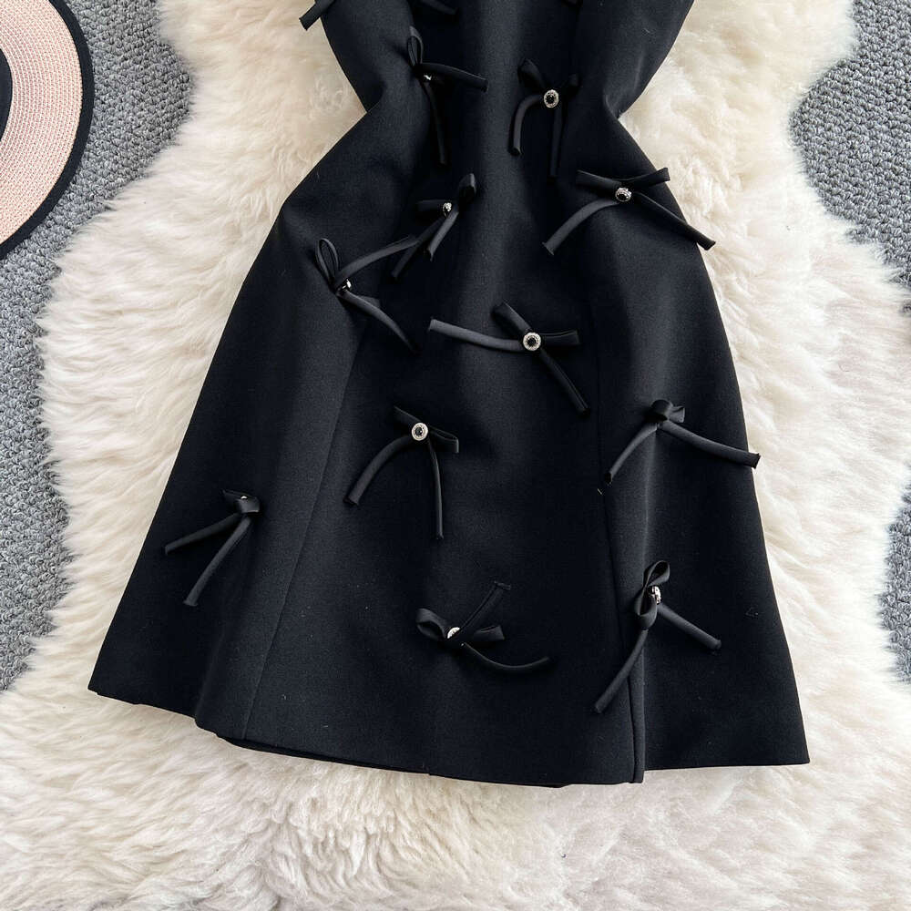 Designer European and American sweet and spicy girl backless collar summer fashion heavy bow slim fit A-line small black dress