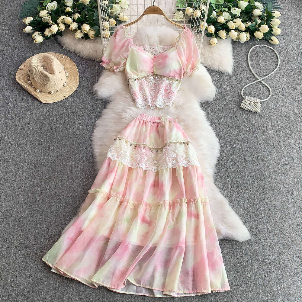 2026 French elegant fairy like women's lace patchwork short shirt slim fit design paired with tassel cake skirt