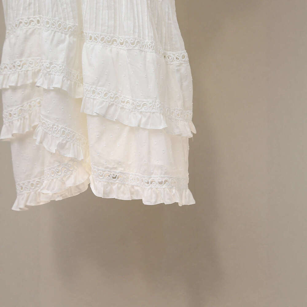 2026 Spring/Autumn New Designer French White Moonlight Lace Dress with Hollow out Ruffle Short Skirt