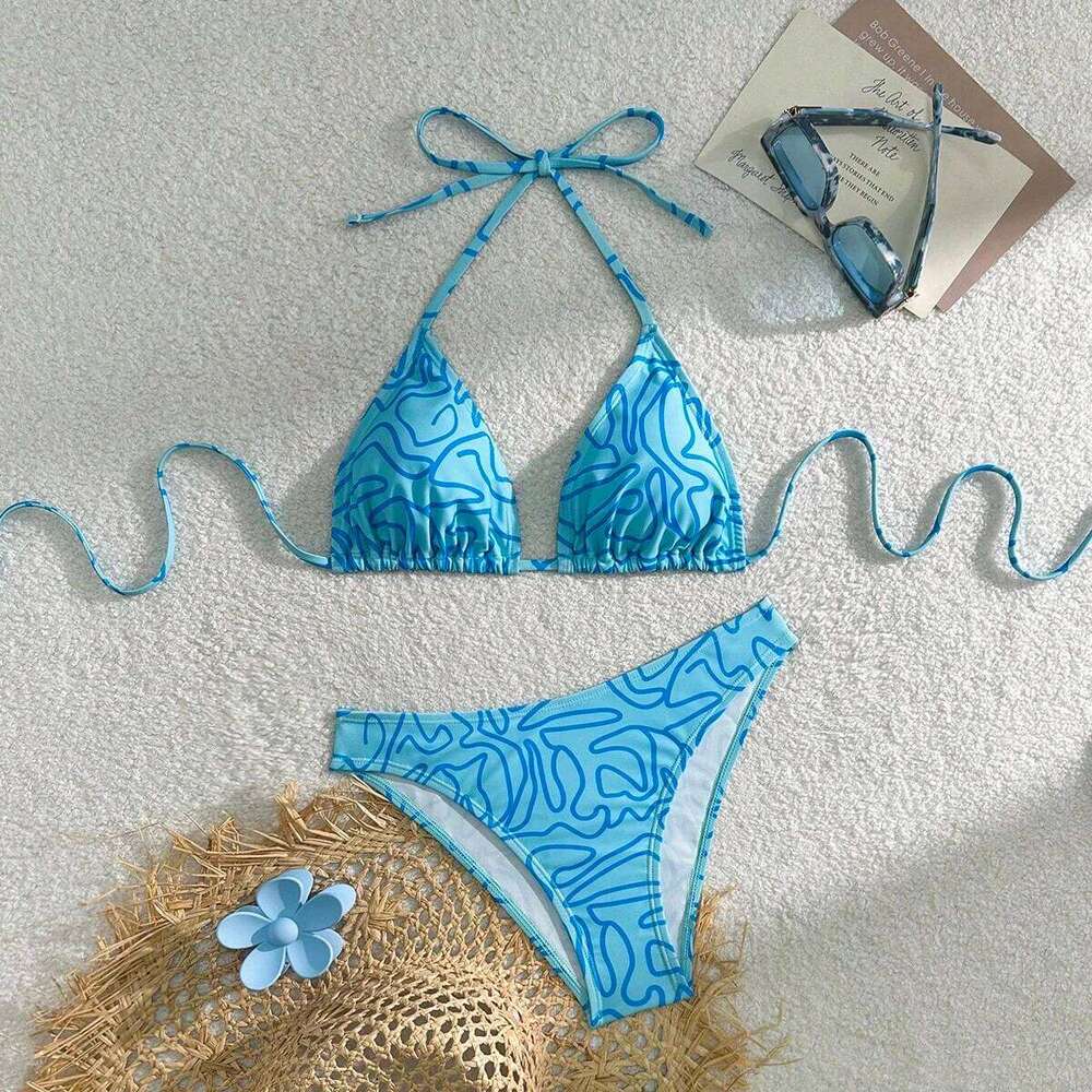 The blue striped bikini design fashionable individual the halterneck tie can be adjusted freely and it is a must-ha 26H0313