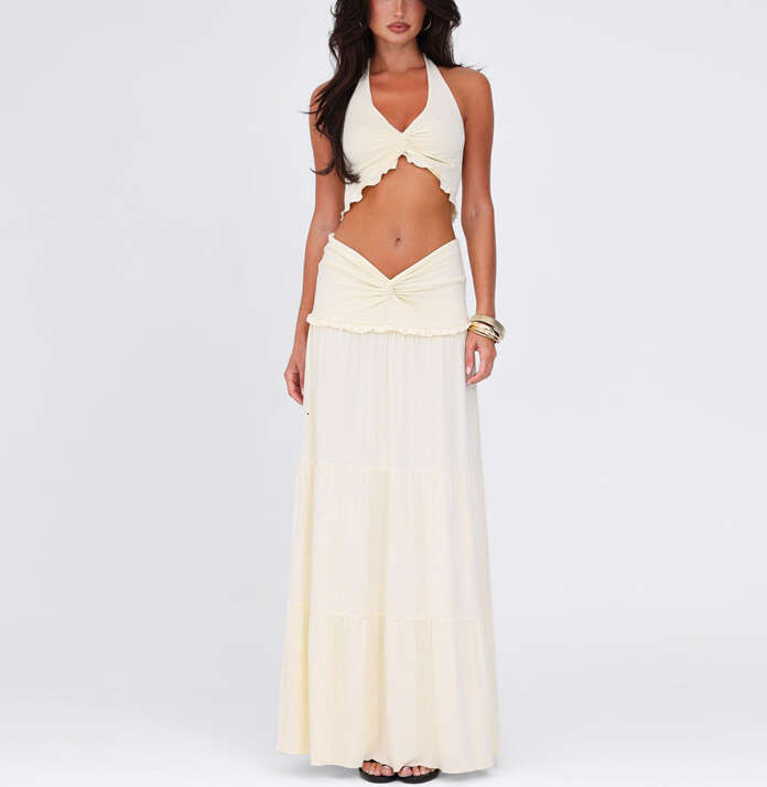 2026 spring and summer women's niche fashion sexy backless and navel exposed top low waist long skirt set