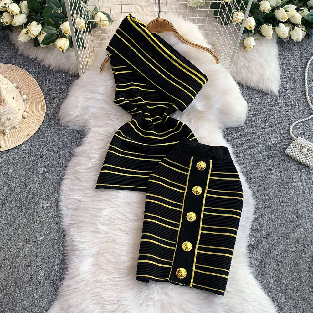 2026 European Fashion Asymmetric Collar Sleeveless Ruffle Knitted Top c10 Luxury Meal Button and Slimming Half Skirt Two Piece Set