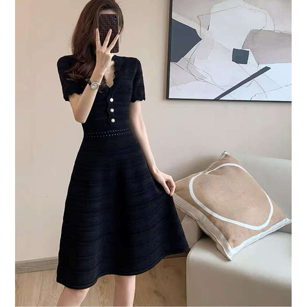 French wave edge V-neck high waisted hollow knit slim fit 2026 spring and summer olive green short sleeved A-line dress