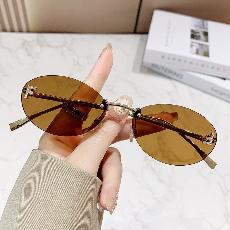 Frameless Designer Sunglasses with Diamond-Encrusted Oval Frames Fashion Sunglasses