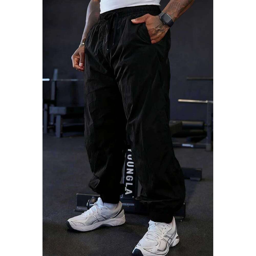 Spring and autumn men's outdoor lightweight stretch pure-color training pants, fashionable sports loose-cuffed long pants Z260315