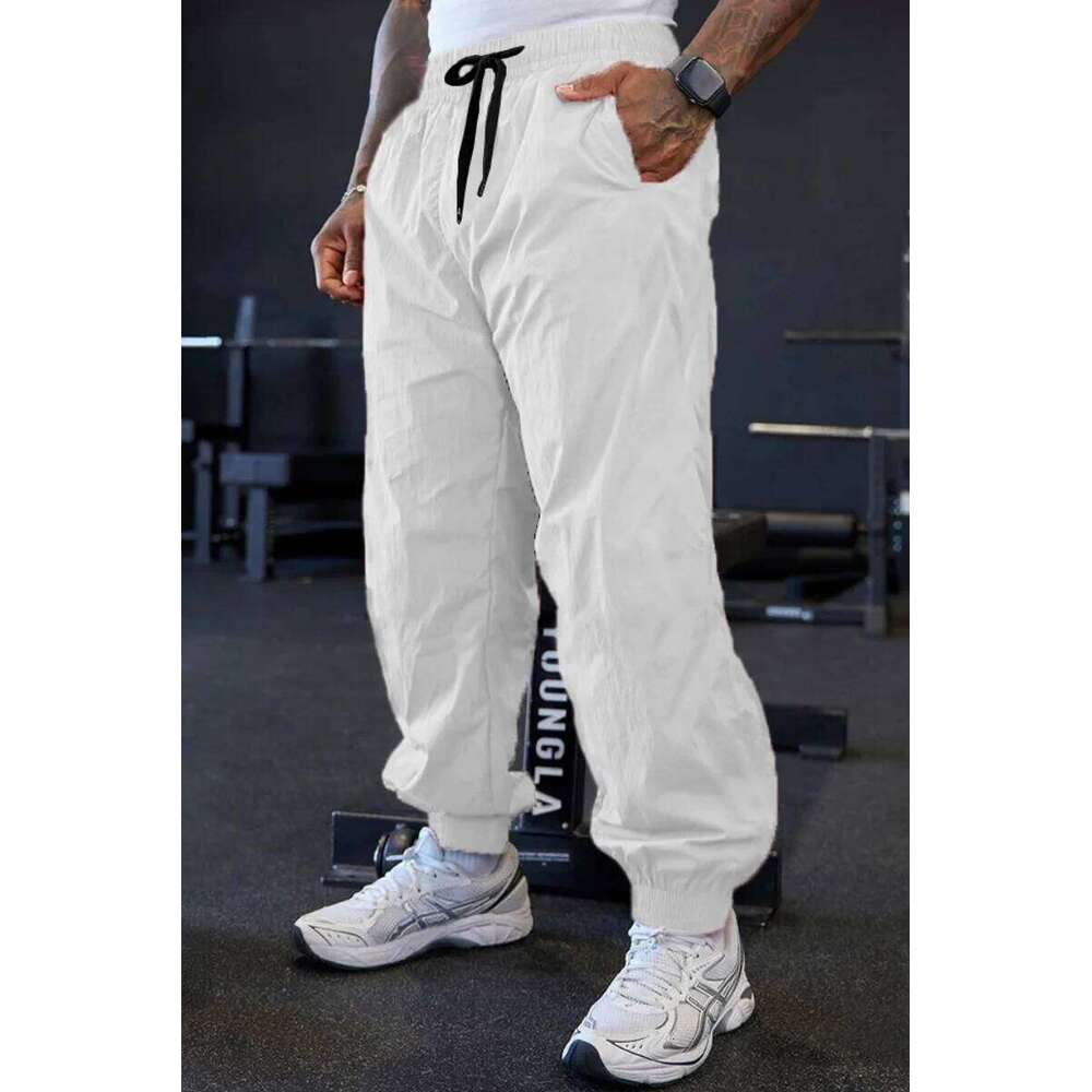 Spring and autumn men's outdoor lightweight stretch pure-color training pants, fashionable sports loose-cuffed long pants Z260315