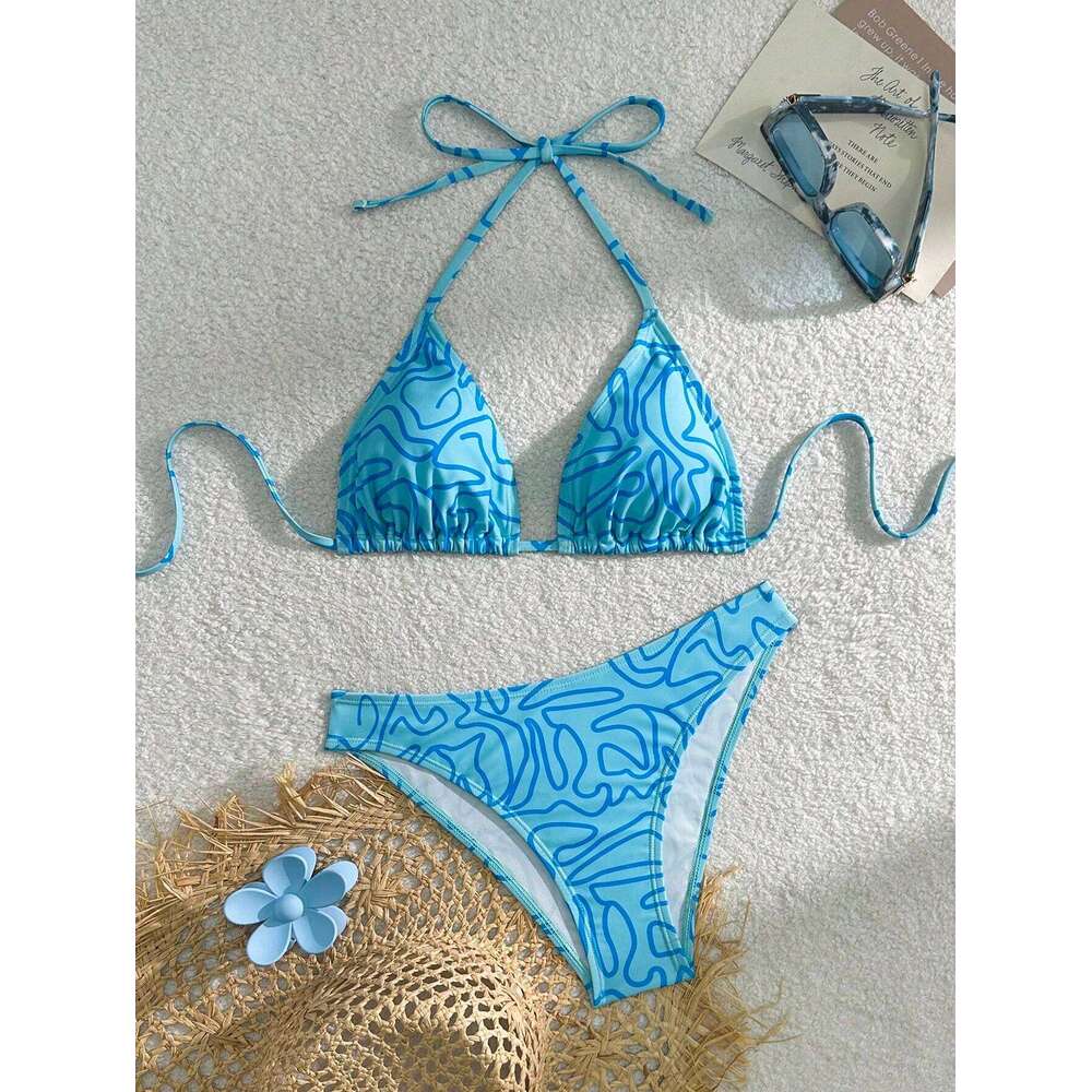 The blue striped bikini design fashionable individual the halterneck tie can be adjusted freely and it is a must-ha 26H0313