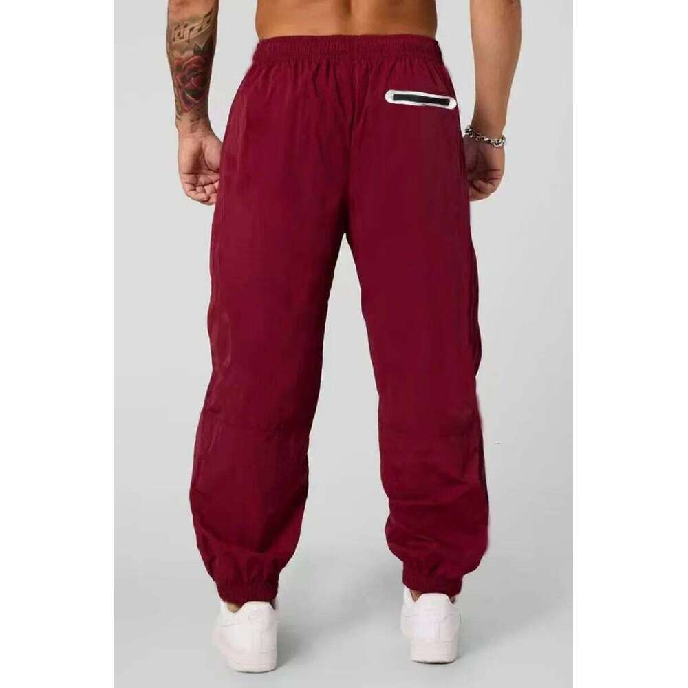 Spring and autumn men's outdoor lightweight stretch pure-color training pants, fashionable sports loose-cuffed long pants Z260315