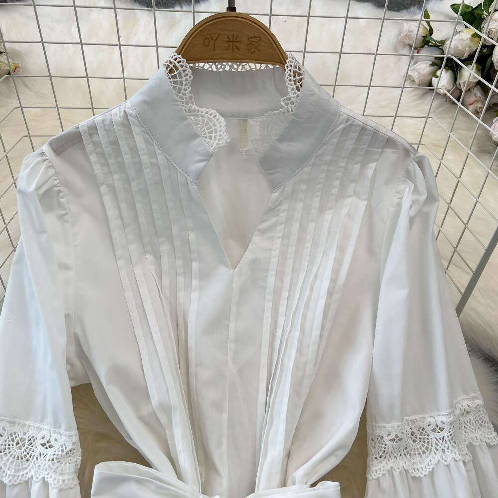 Designer fashion long sleeved V-neck pleated waist slim fit A-line hollow lace dress paired with elegant long skirt