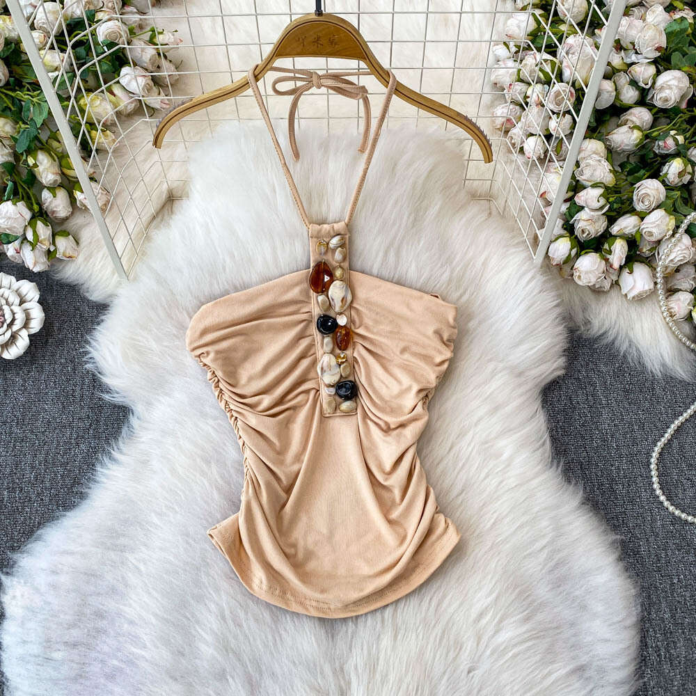 Designer European and American niche pearl jewelry suspender women's 2026 summer new item pleated waist slimming short for outerwear
