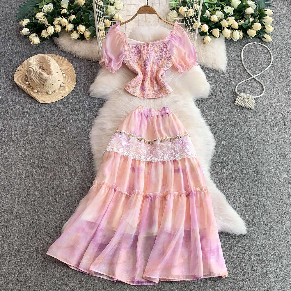 2026 French elegant fairy like women's lace patchwork short shirt slim fit design paired with tassel cake skirt