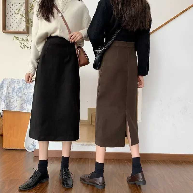 Woolen midi skirt for women high waisted autumn and winter 2026 new item covering the hips to show off thinness medium to lo M260314