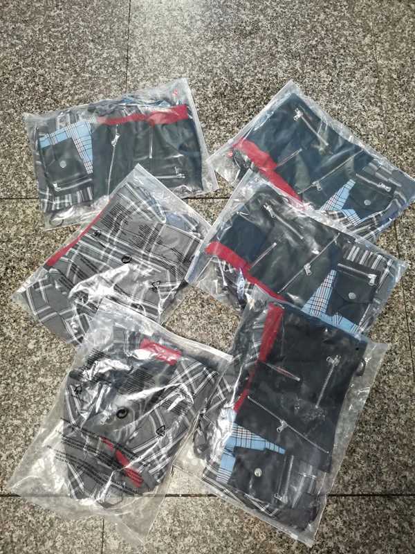 2025 Trending Women Plaid Leather Patchwork Design Mini Skirts Streetwear Female Modern Punk Irregular Y2k Pleated Short Skirt M260314